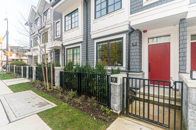 Furnished 4-bedroom townhouse with red front door and black fencing. - 9 - 1133 Ridgewood Drive, North Vancouver