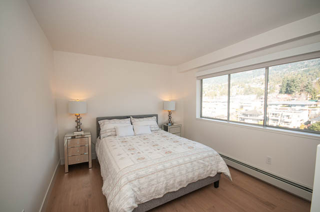 Bright and airy 1-bedroom condo with a city view and hardwood floors. - 708 - 150 24th St, West Vancouver