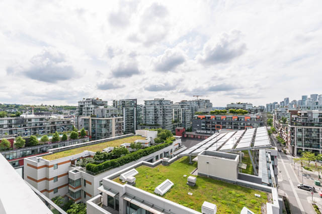 Bright living room with city view and modern furnishings. - 1101 - 1661 Ontario Street, Vancouver West Side