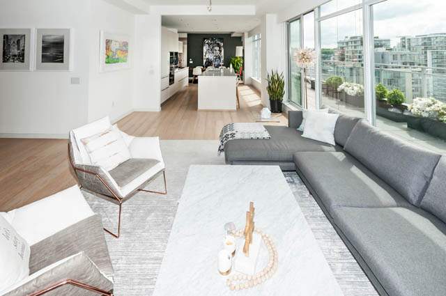 Bright living room with modern furniture, hardwood floors, and city view. - 1101 - 1661 Ontario Street, Vancouver West Side