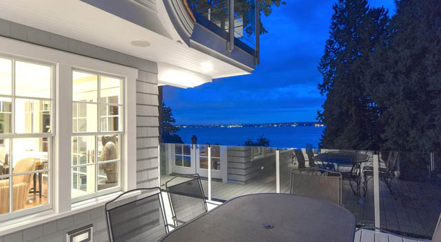 Furnished living room with city view and modern furnishings. - 235 Maple Lane, West Vancouver