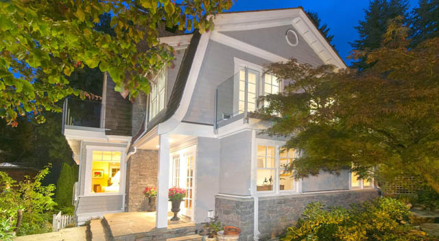 Furnished 3-bedroom + den house with modern exterior, large windows, and lush landscaping. - 235 Maple Lane, West Vancouver