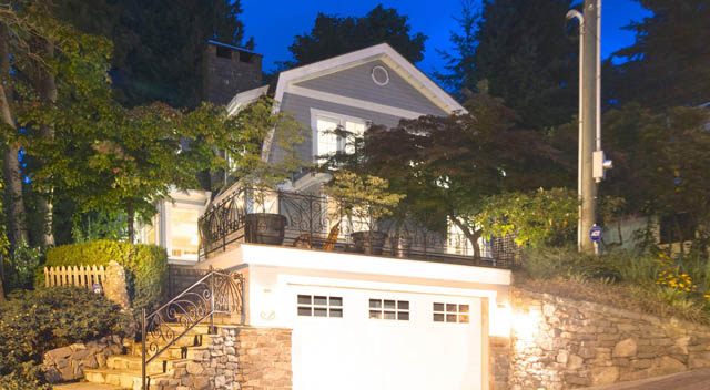 Furnished 3-bedroom + den house with a cozy front porch and lush greenery. - 235 Maple Lane, West Vancouver