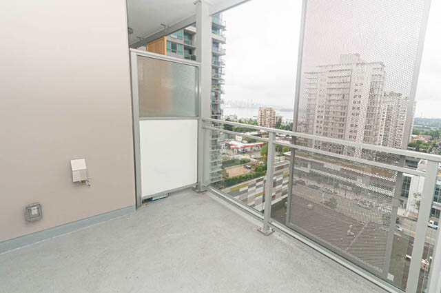 Spacious balcony with city view and modern furnishings. - 1105 - 125 E 14th St, North Vancouver