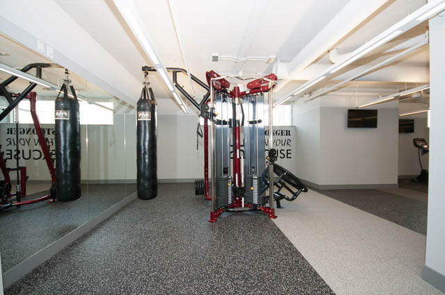 Fitness room with punching bags and weight equipment. - 1105 - 125 E 14th St, North Vancouver