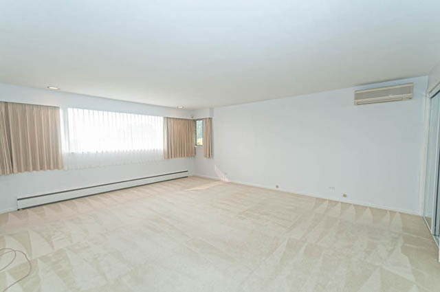 Spacious living room with marble floors and large windows. - 669 Eyremount Drive, West Vancouver