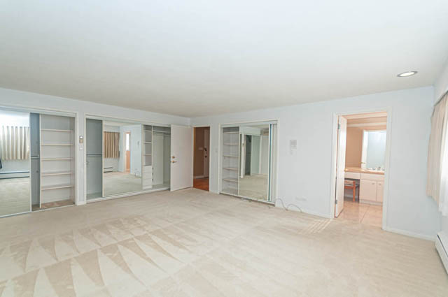 Bright living room with large windows and tiled floor. - 669 Eyremount Drive, West Vancouver