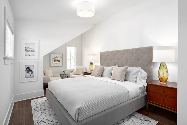 Spacious bedroom with a large bed, white bedding, and a quilted headboard. - 201 - 1785 W 16th Avenue, Vancouver West Side