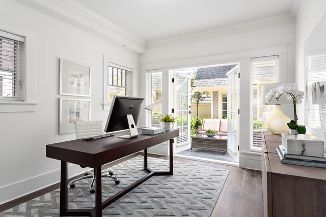Bright and airy home office with large windows, modern desk, and hardwood floors. - 201 - 1785 W 16th Avenue, Vancouver West Side