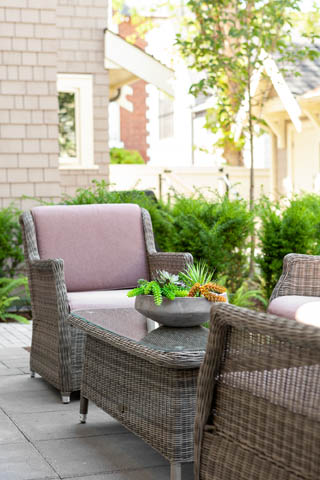 Furnished patio with wicker furniture and greenery. - 201 - 1785 W 16th Avenue, Vancouver West Side