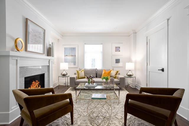 Bright living room with fireplace, modern furniture, and large windows. - 201 - 1785 W 16th Avenue, Vancouver West Side