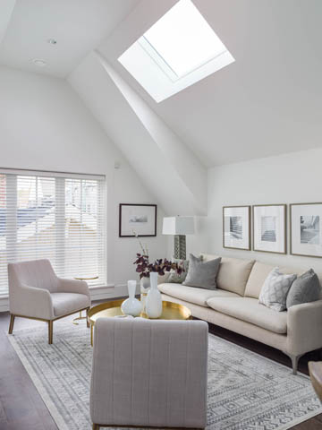 Bright living room with skylight, modern furniture, and neutral tones. - 3170 Burrard St, Vancouver West Side