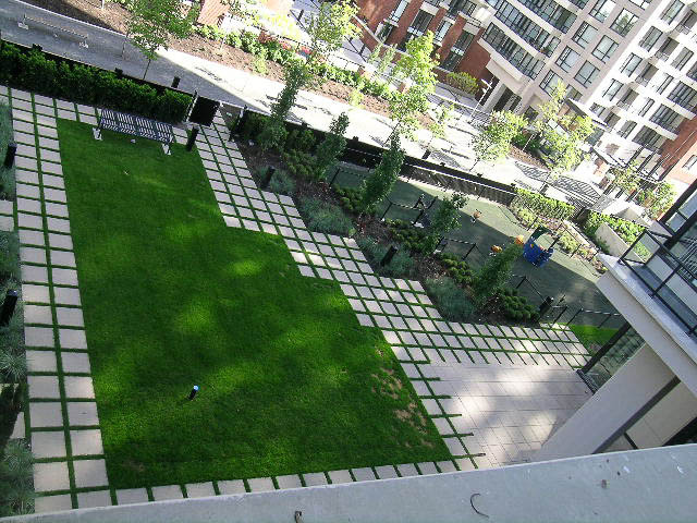 Furnished living room with large windows, city view, and cozy seating area. - 1602 - 977 Mainland Street, Vancouver Downtown