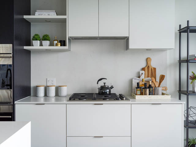 Bright kitchen with white cabinets, marble countertops, and modern decor. - 805 -  210 E 5th Avenue, Vancouver East Side