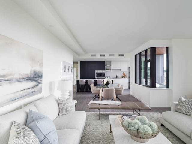 Bright living room with modern furniture, large windows, and a cozy ambiance. - 805 -  210 E 5th Avenue, Vancouver East Side