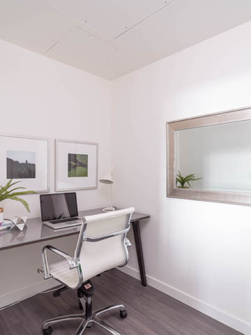 Bright office with white walls, modern desk, and framed artwork. - 805 -  210 E 5th Avenue, Vancouver East Side