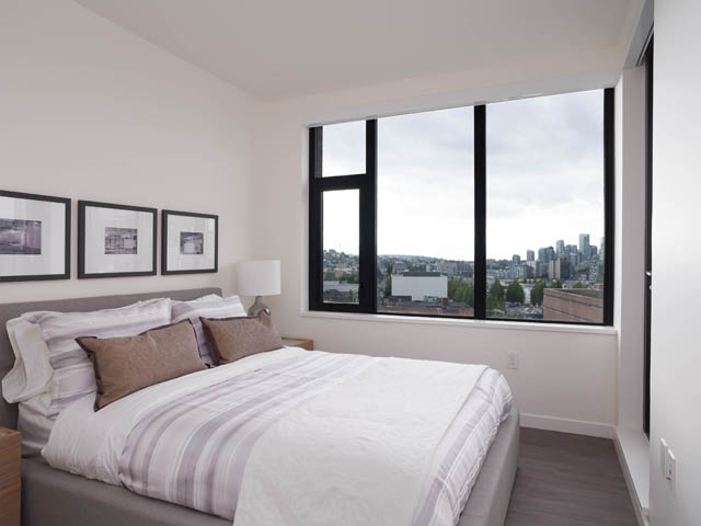 Spacious penthouse bedroom with large windows offering a city view. - 805 -  210 E 5th Avenue, Vancouver East Side
