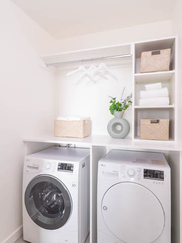 Bright laundry room with white appliances and storage shelves. - 805 -  210 E 5th Avenue, Vancouver East Side