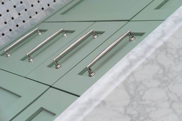 Bright kitchen with mint green cabinets and marble countertops. - 200 - 1775 W 16th Avenue, Vancouver West Side