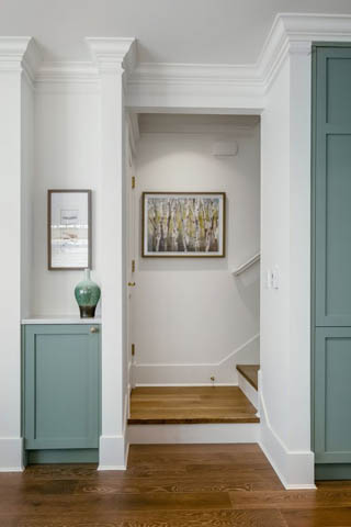 Bright entryway with teal cabinets and hardwood floors. - 200 - 1775 W 16th Avenue, Vancouver West Side