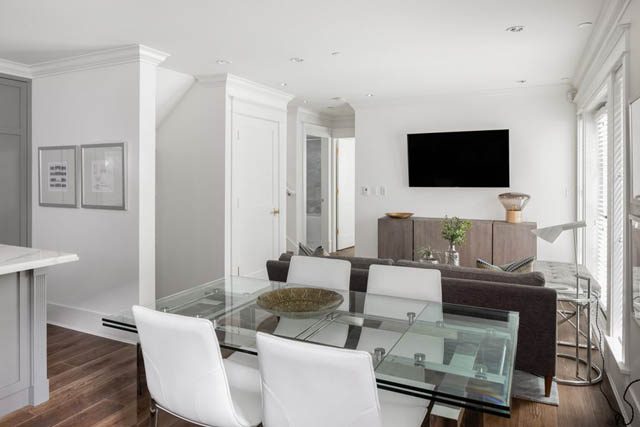 Bright living room with hardwood floors and modern furniture. - 	1783 W 16th Ave, Vancouver West Side