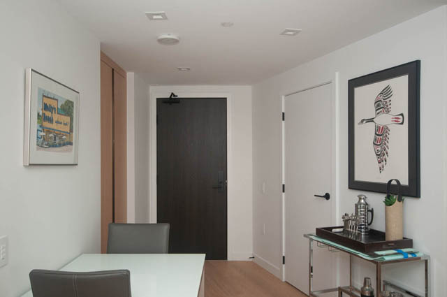 Bright kitchen with modern appliances and wooden cabinets. - 1803 - 620 Cardero Street, Vancouver Downtown