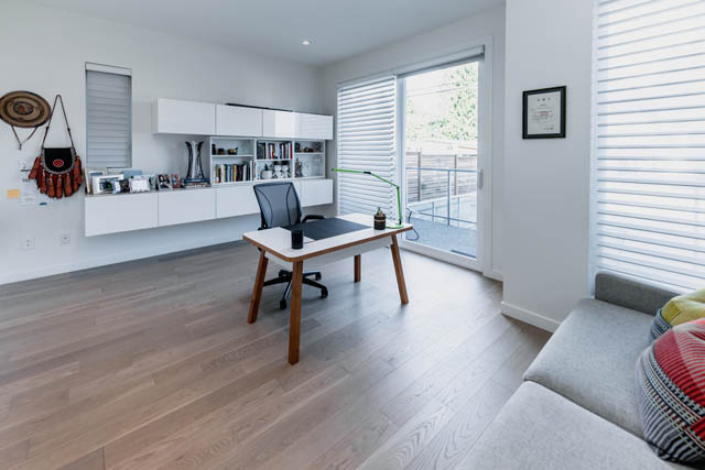 Bright home office with hardwood floors and a view of the backyard. - Address WITHHELD, North Vancouver