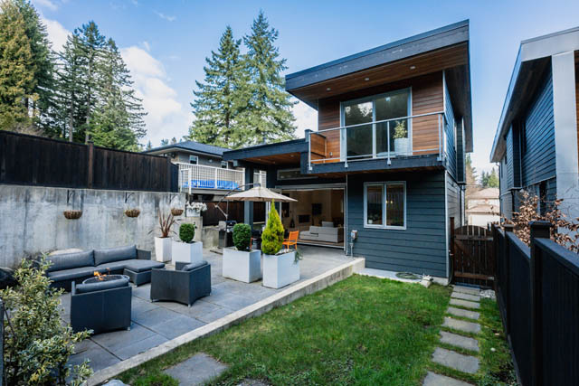 Furnished 4-bedroom house with modern design, large balcony, and outdoor seating area. - Address WITHHELD, North Vancouver