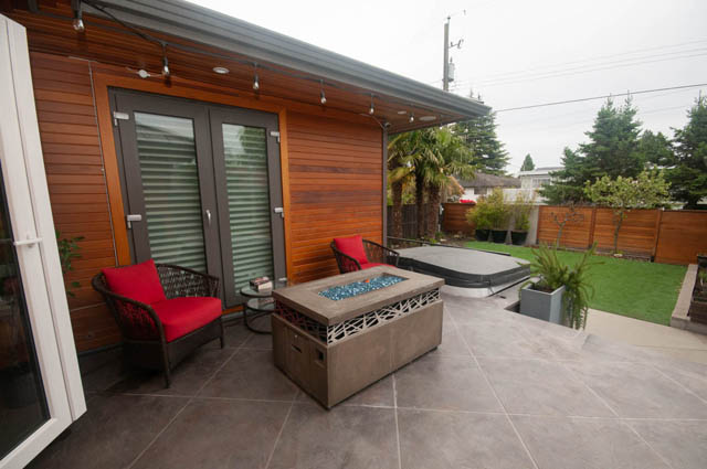 Furnished patio with outdoor seating and modern decor. - Upper - 876 48th Ave, Vancouver West Side