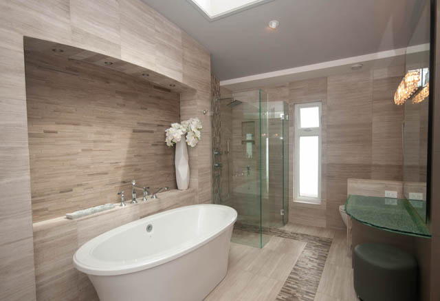 Spacious bathroom with modern fixtures, glass shower, and wooden accents. - Upper - 876 48th Ave, Vancouver West Side