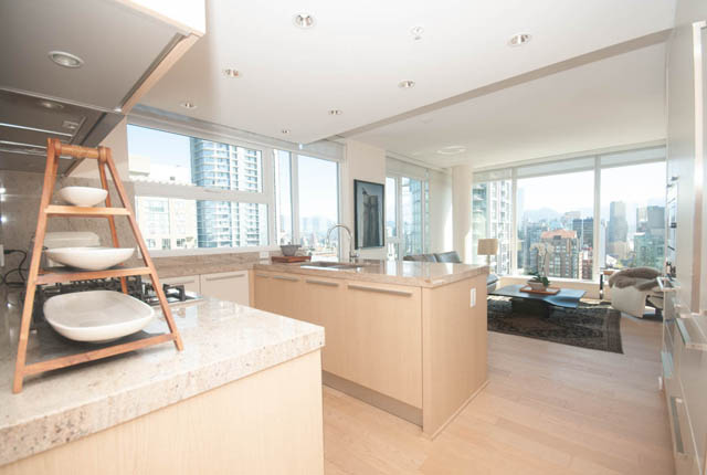 Bright kitchen with granite countertops, hardwood floors, and a city view. - 3301 - 1351 Continental Street, Vancouver Downtown