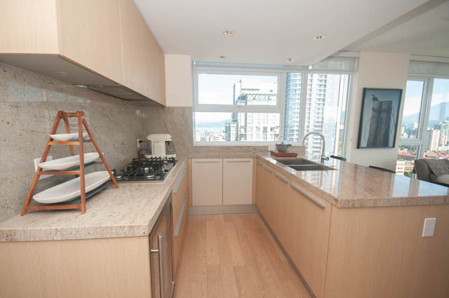 Bright kitchen with granite countertops and city view. - 3301 - 1351 Continental Street, Vancouver Downtown