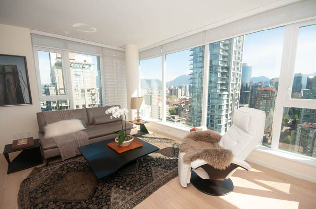 Bright living room with city view, modern furnishings, hardwood floors. - 3301 - 1351 Continental Street, Vancouver Downtown