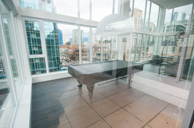 Furnished living room with hardwood floors and city view. - 3301 - 1351 Continental Street, Vancouver Downtown