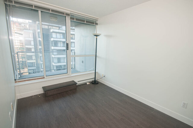 Spacious den with hardwood floors, city view, and modern sliding glass doors. - 1907 - 1420 West Georgia Street, Vancouver Downtown