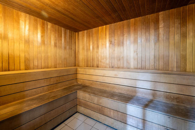 Spacious, cozy sauna with wooden paneling and built-in seating. - 2607 - 939 Homer St, Vancouver Downtown
