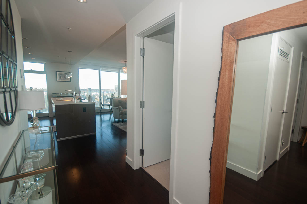 Bright living room with hardwood floors and a city view. - 4502 - 777 Richards St, Vancouver Downtown
