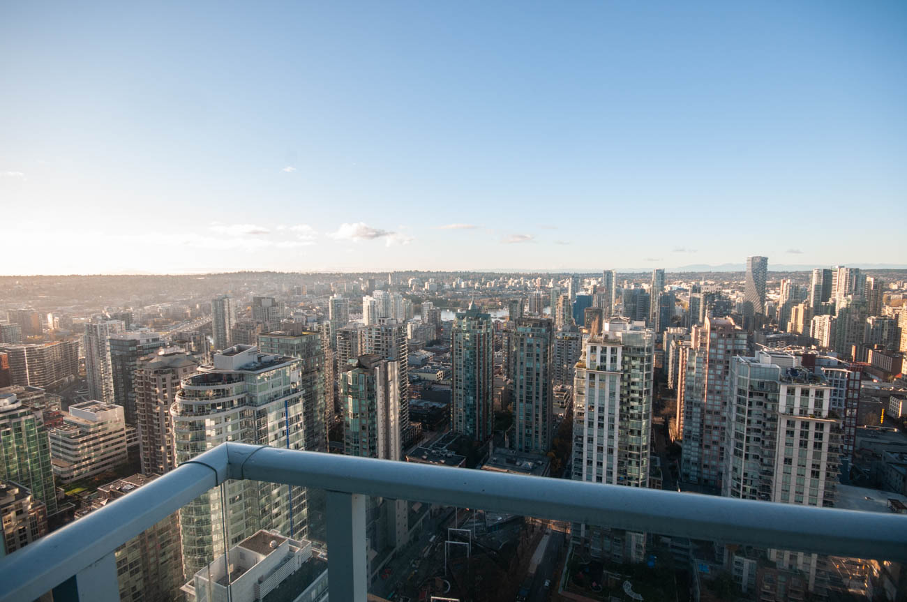 Furnished 2-bedroom condo with stunning city view and modern balcony railings. - 4502 - 777 Richards St, Vancouver Downtown