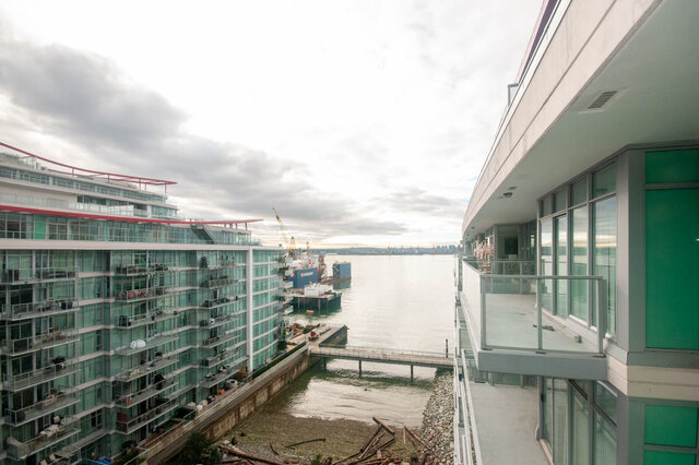 Spacious 2-bedroom condo with stunning city waterfront view and modern furnishings. - 912 - 175 Victory Ship Way, North Vancouver