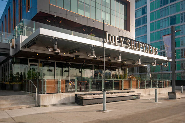 Spacious 2-bedroom condo with modern furnishings and a city view. - 912 - 175 Victory Ship Way, North Vancouver