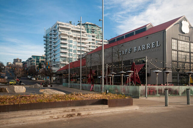 Spacious 2-bedroom condo with modern furnishings and a stunning city view. - 912 - 175 Victory Ship Way, North Vancouver