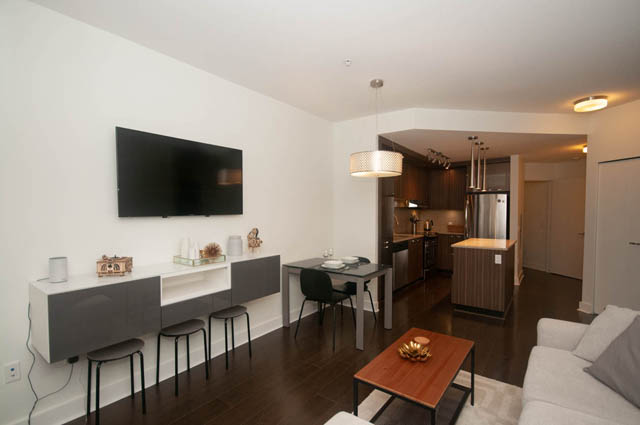 Furnished 1-bedroom + den with hardwood floors and a modern kitchen. - 211 - 733 West 14th, North Vancouver