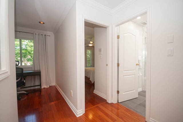 Bright living room with hardwood floors and a view of the city. - Upper  - 2318 West 14th Ave, Vancouver West Side