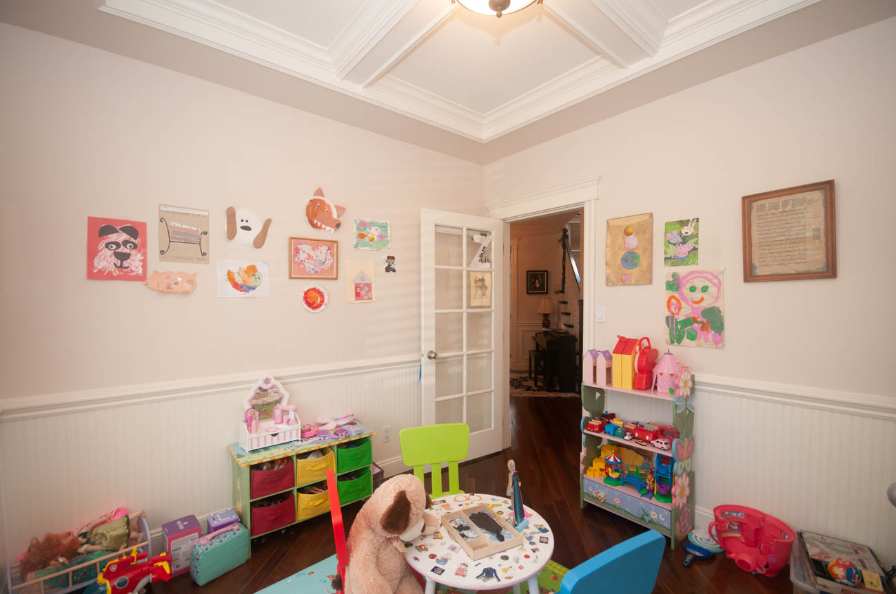 Bright playroom with colorful furniture and artwork, hardwood floors. - 3440 Wellington Crescent, North Vancouver