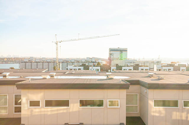 Spacious 3-bedroom townhouse with a stunning city view and modern furnishings. - 30 - 533 East 3rd st., North Vancouver