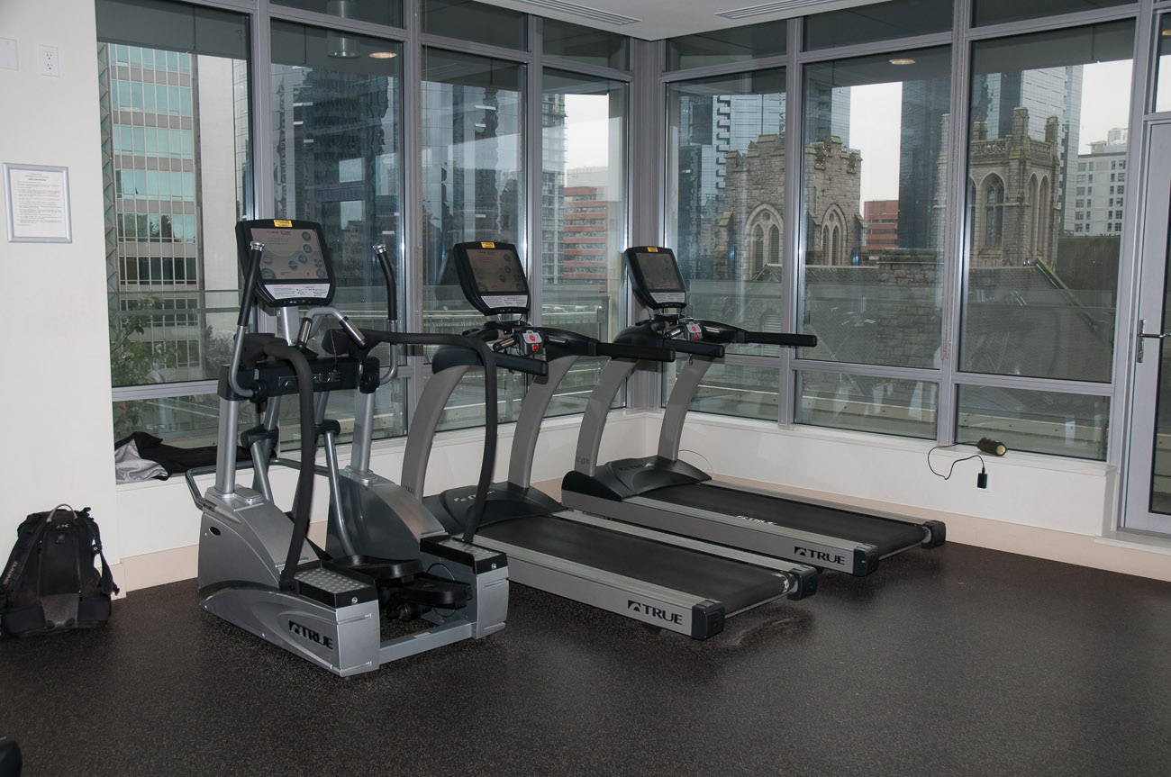Bright fitness room with city view, modern cardio equipment. - 3501 - 1028 Barclay, Vancouver Downtown