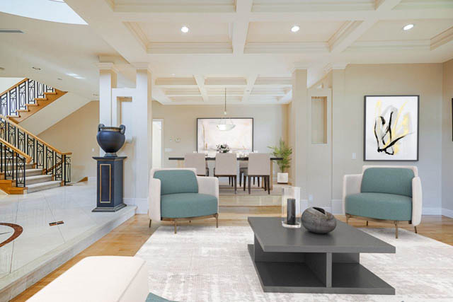 Spacious living room with coffered ceiling, modern furniture, and abstract art. - 1128 W 49th, Vancouver West Side