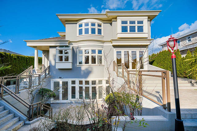Furnished 6-bedroom house with large bay windows and modern exterior. - 1128 W 49th, Vancouver West Side