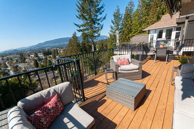 Spacious deck with outdoor furniture and city view, perfect for relaxation. - 2128 Grand Blvd, North Vancouver