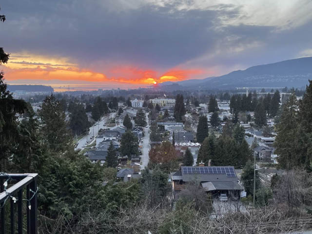 Spacious 4-bedroom house with stunning city view and vibrant sunset backdrop. - 2128 Grand Blvd, North Vancouver
